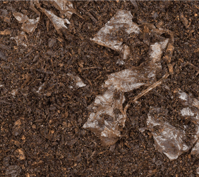Packaging being composted in soil